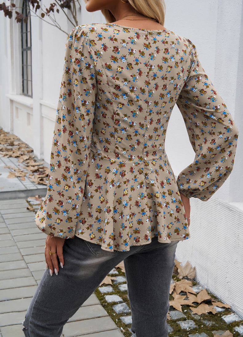 Bluse mit Blumenmuster und langen Ärmeln und Schößchen